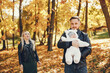 © prostooleh - Family with daughter in a autumn park