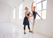 © Alex S/peopleimages.com - Ballet teacher, dancer and student training in a dance studio together. Fitness, learning and motivation, the support of a woman coach for young girl ballerina. Health, sport and the art of dancing.
