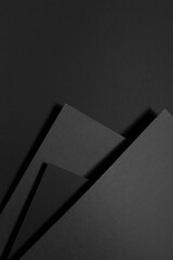Poster - dark grey carbon textured abstract geometric background with soar stepped rectangle surfaces, angles