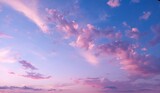 Fototapeta Psy - Blue and pink sky background. Beautiful sky with clouds in pink background