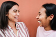 © DisobeyArt - Hispanic friends having fun laughing together outdoor - Focus on right girl eye