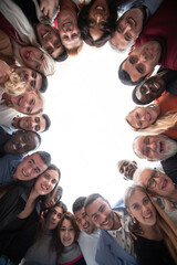 large group of various happy people standing in a circle.