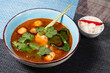 tom yum soup with rice and chili pepper