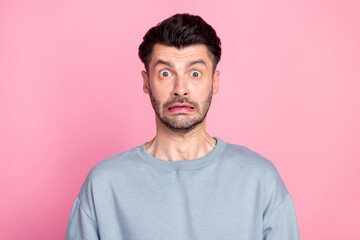 Canvas Print - Portrait of confused terrified man make scared grimace staring isolated on pink color background