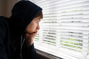 Canvas Print - Young Man near the Window