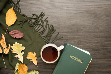 Wall Mural - Bible, cup of coffee and autumn leaves