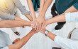 © Sanele Gobinduku/peopleimages.com - Support, trust and collaboration of business people pile hands together in agreement of partnership in an office. Teamwork, team building and celebrating company growth and diversity