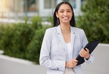 Business, corporate and finance woman worker with a happy smile outdoor on a work break. Portrait of a young financial lawyer employee with a contract feeling motivation and happiness from career