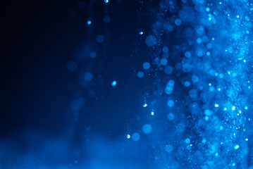 abstract blue bokeh defocus glitter blur background.