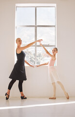 Wall Mural - Student, teacher and girl learning ballet stage theatre performance balance, art and training in dance class studio. Lifestyle, energy and woman teaching and coaching young ballerina to master talent