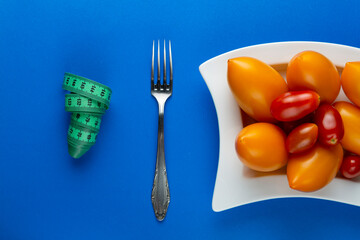 fresh and tasty vegetables on a white dish