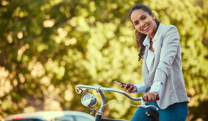 Poster - Business woman, travel with bike and phone in sustainable environment or park with trees. Sustainability corporate worker portrait, bicycle and digital carbon footprint for green, healthy lifestyle