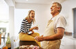 © Mikolette Moller/peopleimages.com - Happy and carefree couple cooking dinner laughing and enjoying the weekend in the kitchen at home. A mature husband relaxing and preparing a meal or lunch for his wife while having fun