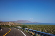 Landscape View Of Winding Road In Baja California Sur, Mexico, Near Sea, During Daytime