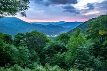 Mesmerizing View Of Mountain Range Covered By Dense Forest, And Lights Of Villages,South Carolina