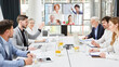 © Robert Kneschke - Group of business people in video conference at meeting