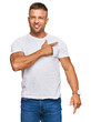 © Krakenimages.com - Handsome muscle man wearing casual white tshirt cheerful with a smile on face pointing with hand and finger up to the side with happy and natural expression