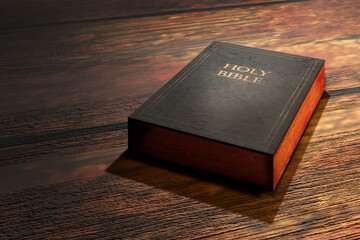 Holy Bible on wooden table. 