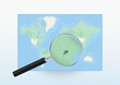 Map of the World with a magnifying glass aimed at Uganda, searching Uganda with loupe.