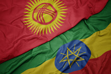 Waving Colorful Flag Of Ethiopia And National Flag Of Kyrgyzstan.