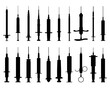 Black silhouettes of syringes on a white background	