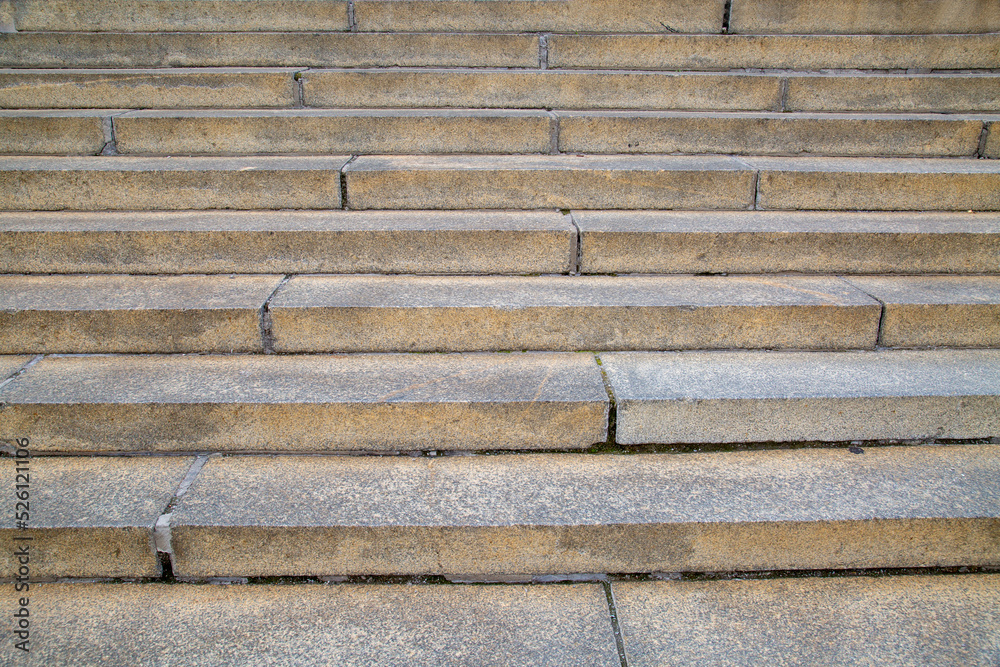 Rectangular beige granite steps on a clear sunny day, texture ...