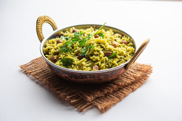 Wall Mural - Palak khichdi is a one pot nutritious meal of mung lentils and rice with spinach, Indian food