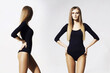 © Acronym - Fit and beautiful fashion model posing in studio. Blond woman in black swimsuit.