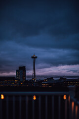 dusk blue view of Seattle skyline from rooftop deck