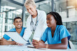 © Anela R/peopleimages.com - Medical, planning and doctor and nurse collaboration on innovation, medicine and health care meeting. Happy, diverse healthcare workers smiling and reading results or feedback from cancer cure trial