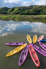 Wall Mural - Multiple kayaks on the lake