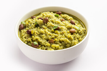 Wall Mural - Palak khichdi is a one pot nutritious meal of mung lentils and rice with spinach, Indian food