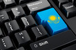Kazakh flag painted on computer keyboard. Online business, education, shopping in Kazakhstan concept. 3D rendering