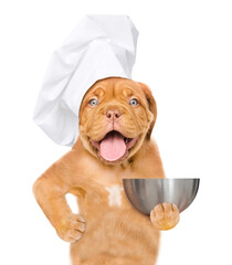 Poster - Happy puppy wearing a chef's cap holds empty bowl. isolated on white background