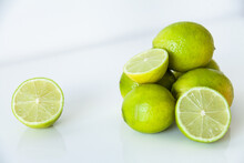 Lime Fruit On White, Ready To Juice For Cool Summer Drink