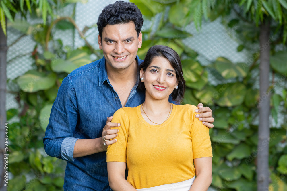 Portrait of happy young indian urban couple looking at camera. Stock ...