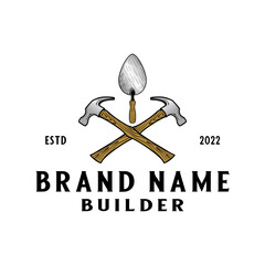 Wall Mural - hammer and trowel vector logo design. trowel concept standing between passing hammers, for building companies