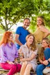 © Sangiao_Photography - Hispanic mature senior group of friends happy together outdoors in a park. lifestyle insurance