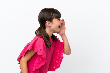 Wall Mural - Little caucasian kid isolated on white background shouting with mouth wide open to the side