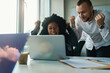 © Svitlana - Office workers at the computer rejoice at a successful deal