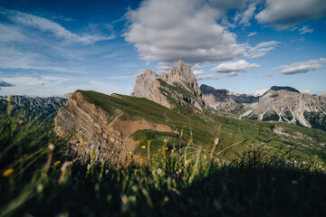 Wall Mural - Amazing views of the Dolomites mountain landscape. Sunset view from Seceda over to the Odle mountains. Spectacular dolomitean landscape, Tyrol, Italy.