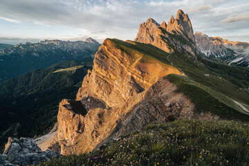 Wall Mural - Amazing views of the Dolomites mountain landscape. Sunset view from Seceda over to the Odle mountains. Spectacular dolomitean landscape, Tyrol, Italy.