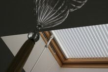 Pleated Blinds On Roof Windows Close Up In The Interior. Blinds For Skylights. White Color. 