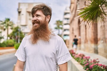 Sticker - Young redhead man smiling happy standing at the city.