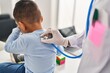 © Krakenimages.com - Mother and son pediatrician and patient auscultating respiratory system at clinic