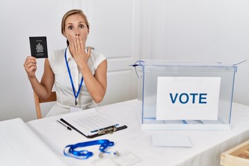 Sticker - Young blonde woman at political campaign election holding canada passport covering mouth with hand, shocked and afraid for mistake. surprised expression