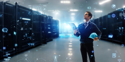 Wall Mural - Engineer standing in server room and digital data concept. Wide image for banners, advertisements.