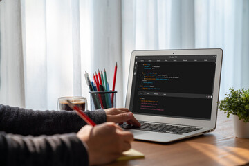 Software development programming on computer screen for modish application and program coding