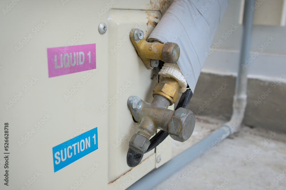 Refrigerant suction line and liquid line of an outdoor condenser unit ...