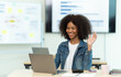 © PaeGAG - Business people showing team work while working in board room in office interior. People helping one of their colleague to finish new business plan. Business concept. Team work.
